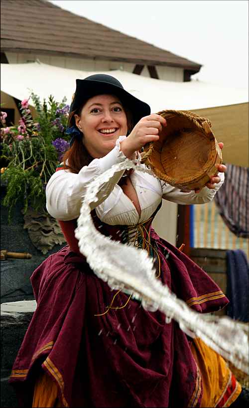 pine bucket and wooden hay forkt in renaissance fair as props