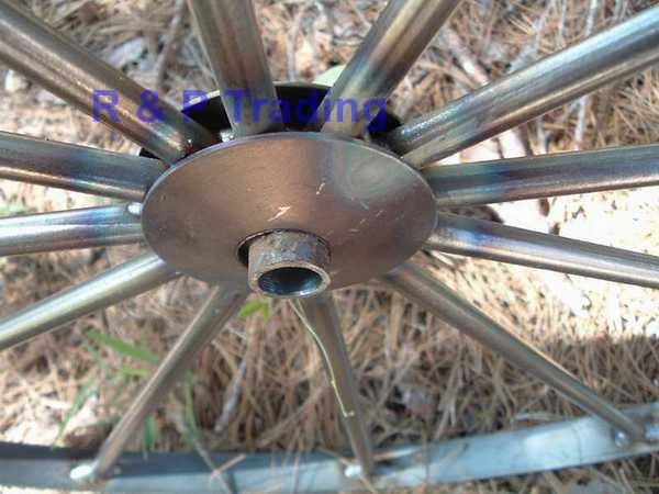 large steel wagon wheel hub closeup